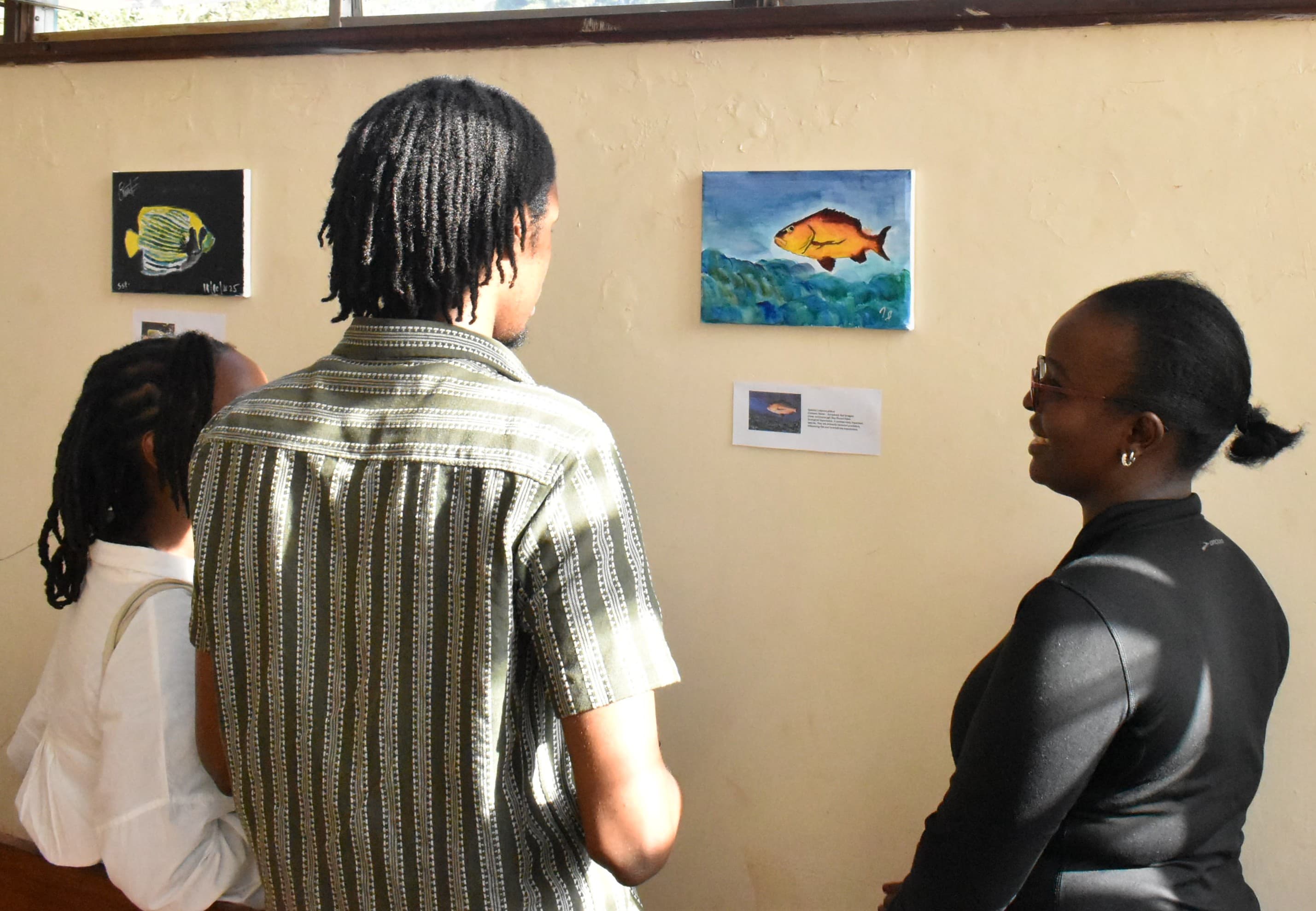 Students looking at paintings