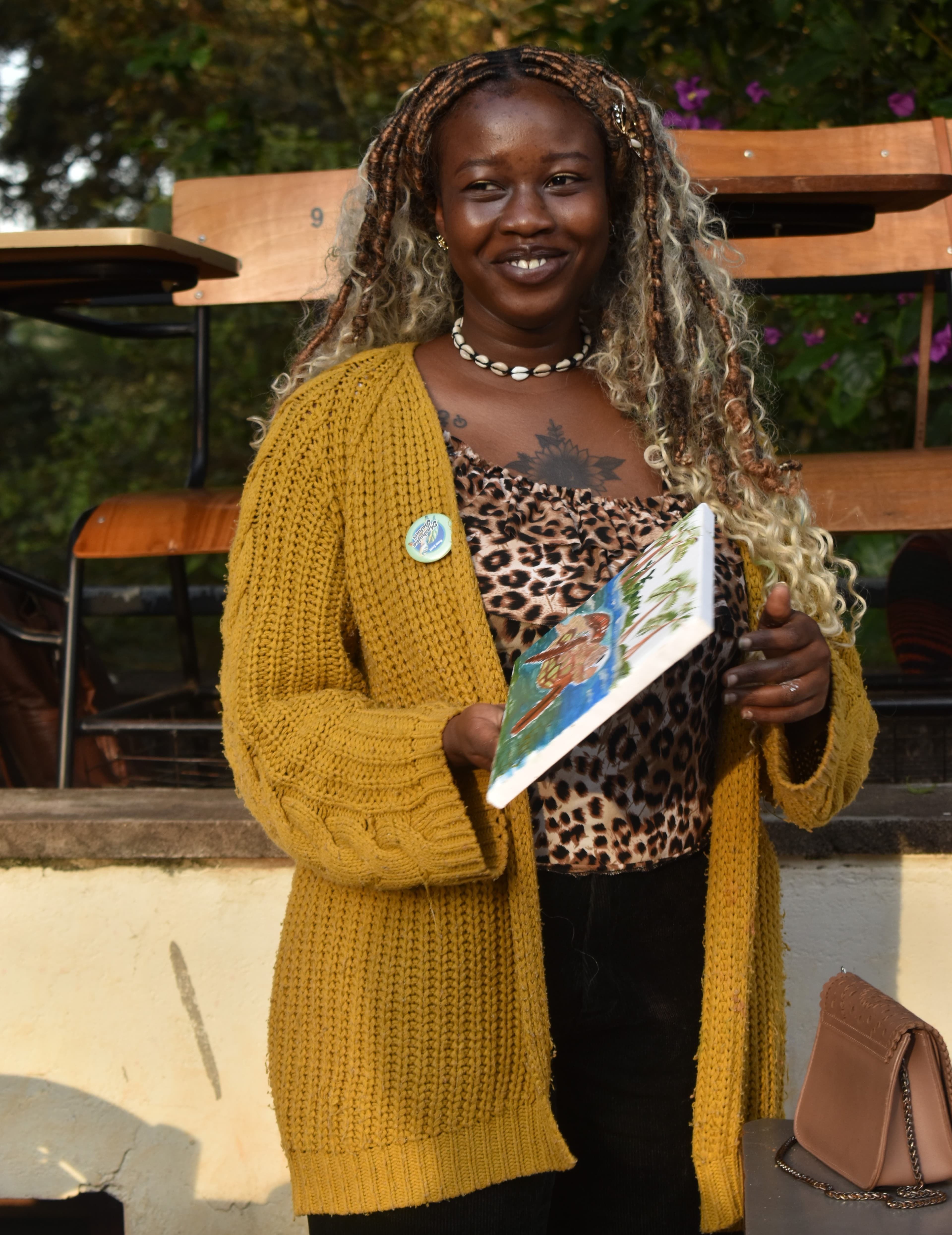 Student presenting painting